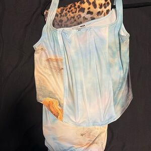 Two piece long skirt set crop top shirt. From fashion nova size size XL stretchy